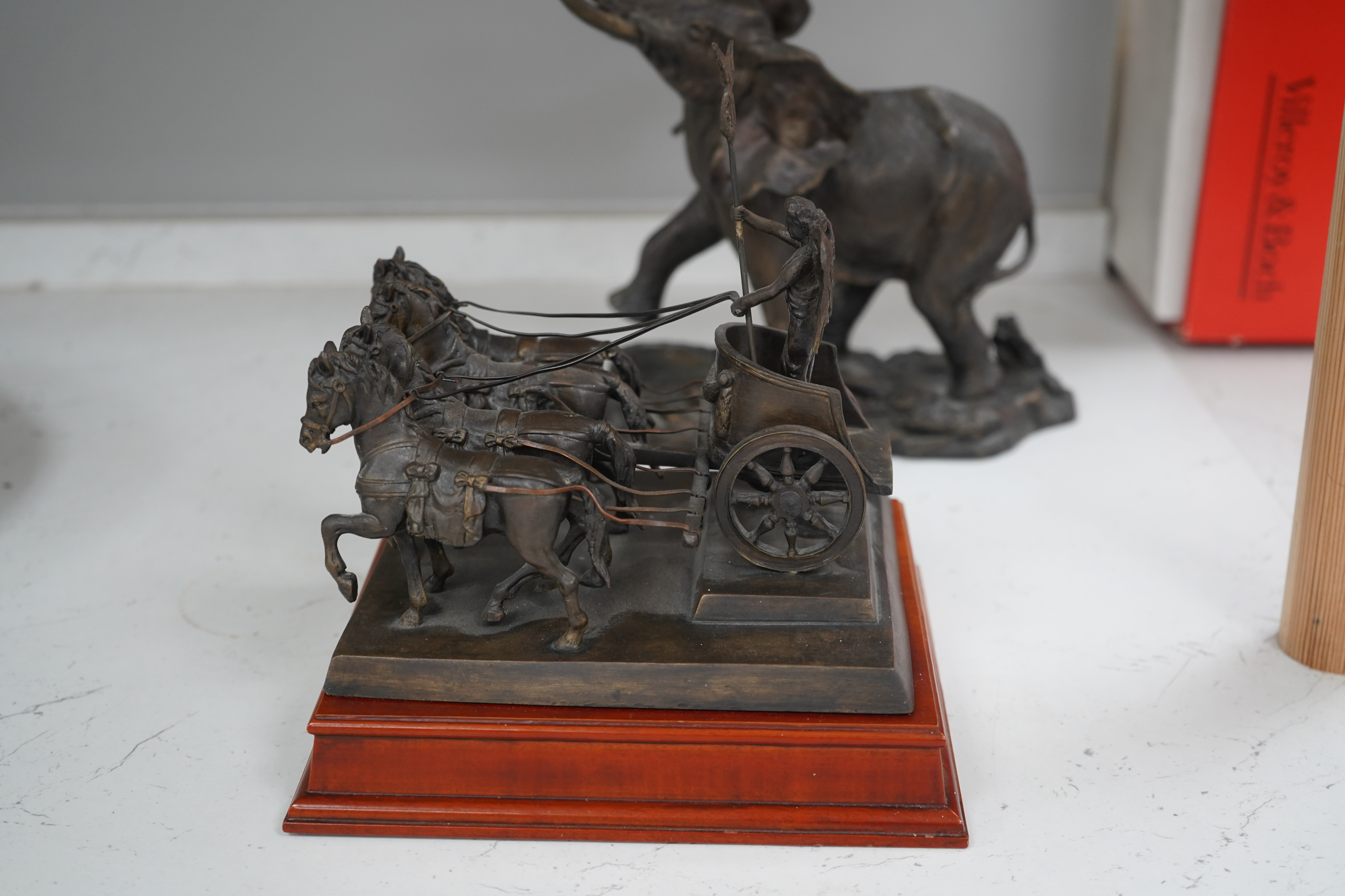 A Franklin Mint bronzed figure of an elephant, 'Giant of the Serengeti', and a Franklin Mint bronzed model 'Quadriga', on wooden plinth, with title plaque, largest 23.5cm. Condition - good